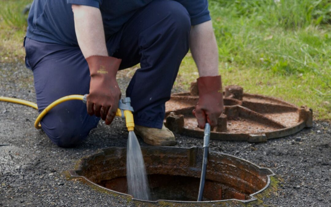 spraying water in drain